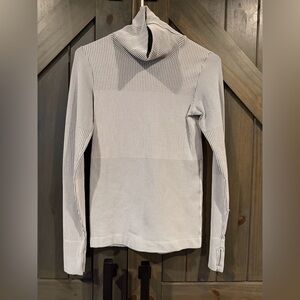 Athleta grey & white turtle neck. Beautiful fit and design. Like new